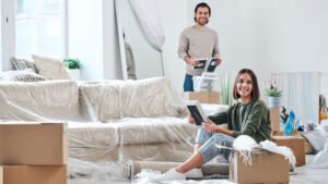 couple packing their luggage to swap home